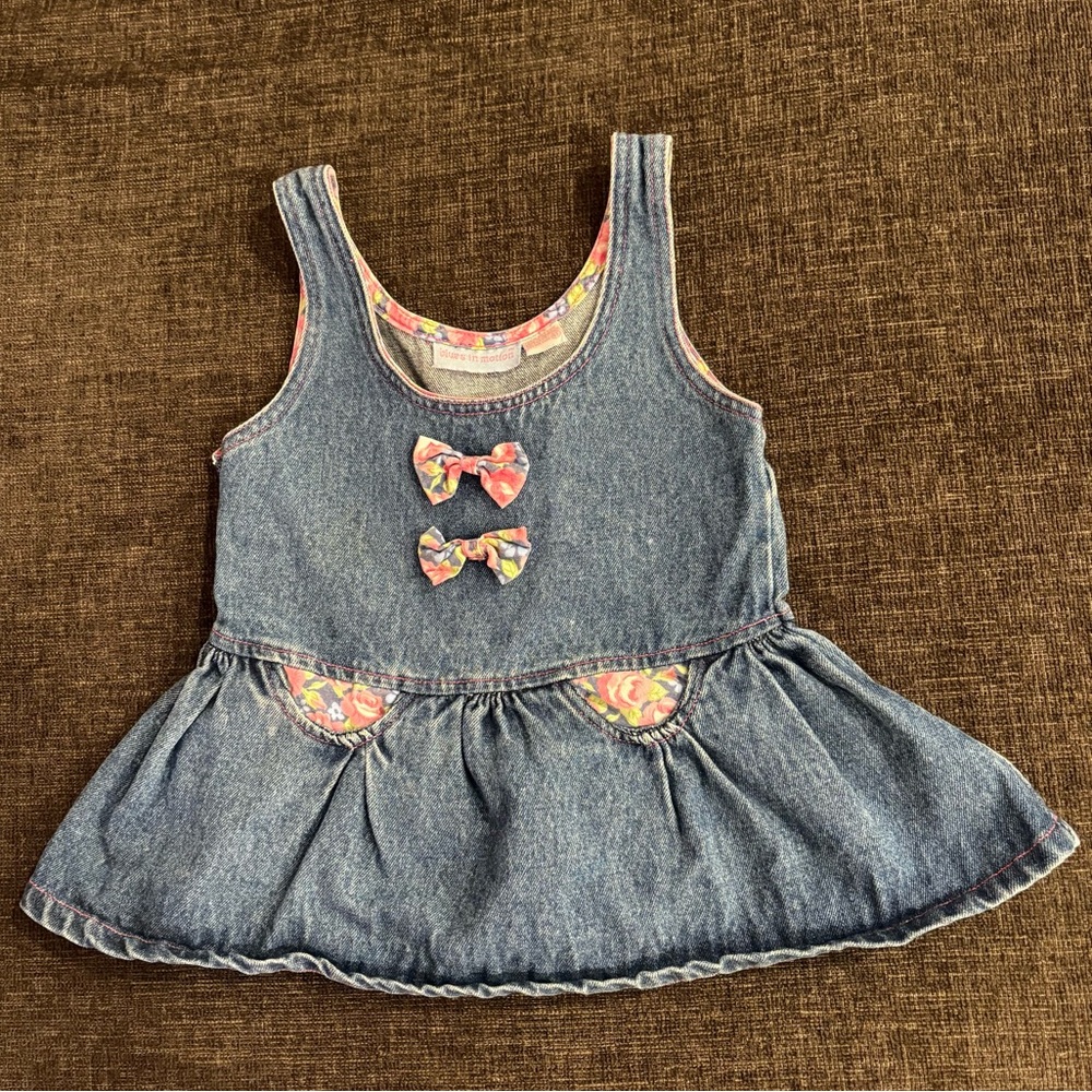 Vintage 90s denim top with floral bow details and front pockets. Size 4T